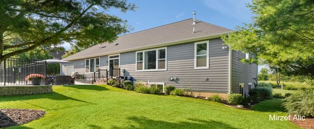 5220 Canyon River Drive NE, Ada, MI 49301
