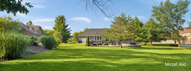5220 Canyon River Drive NE, Ada, MI 49301