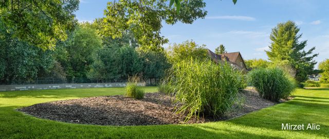 5220 Canyon River Drive NE, Ada, MI 49301