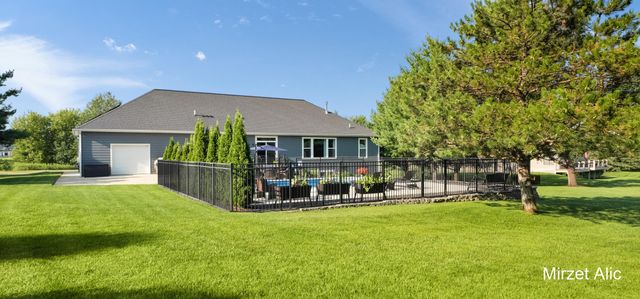 5220 Canyon River Drive NE, Ada, MI 49301