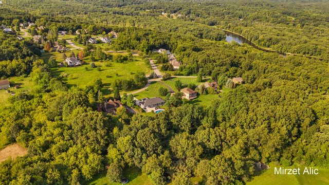 5220 Canyon River Drive NE, Ada, MI 49301