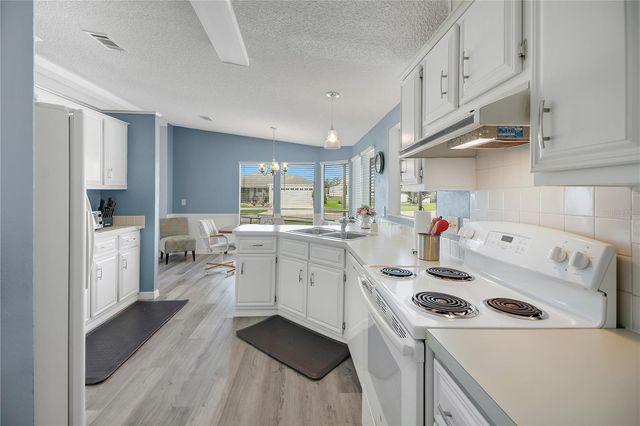 1203 GRANADA COURT, Lady Lake, FL 32159