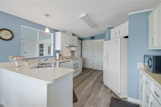 1203 GRANADA COURT, Lady Lake, FL 32159