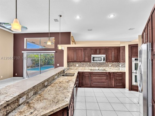 11335 Lake Shore Dr, Cooper City, FL 33026