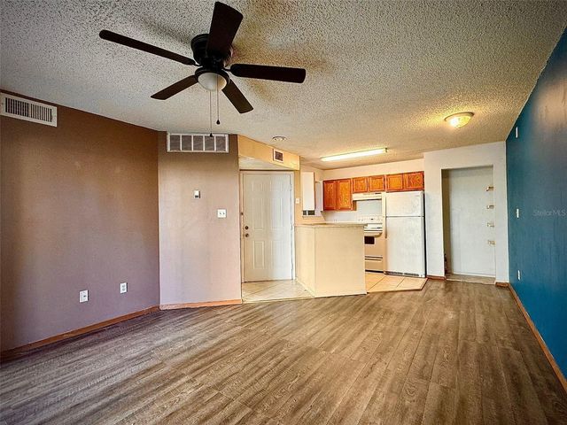 1940 LAKE ATRIUMS CIRCLE 107, Orlando, FL 32839