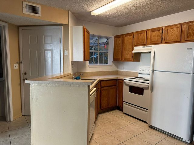 1940 LAKE ATRIUMS CIRCLE 107, Orlando, FL 32839