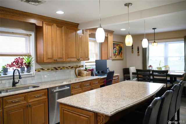 8 Chauncey Lane, Coram, NY 11727