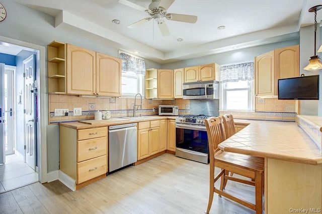 90-10 69th Avenue, Forest Hills, NY 11375