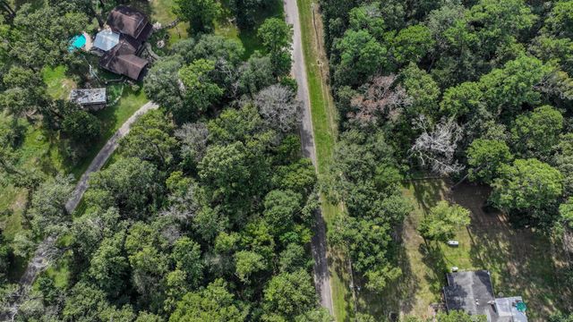 1 Cherry Laurel Ln, New Caney, TX 77357