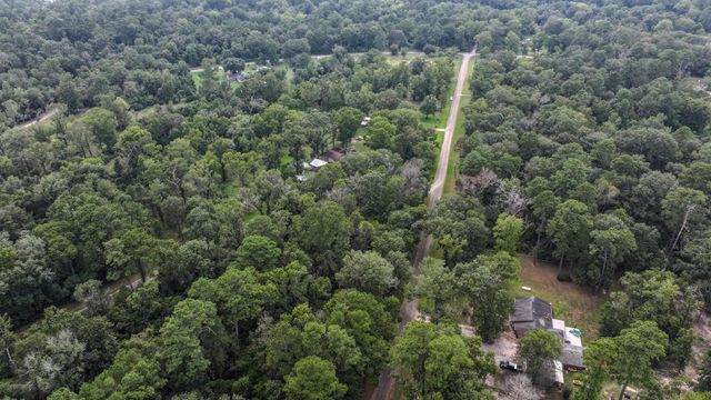 1 Cherry Laurel Ln, New Caney, TX 77357