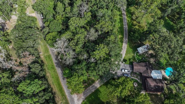 1 Cherry Laurel Ln, New Caney, TX 77357
