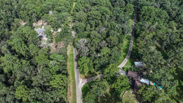 1 Cherry Laurel Ln, New Caney, TX 77357