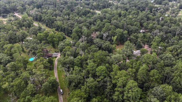 1 Cherry Laurel Ln, New Caney, TX 77357