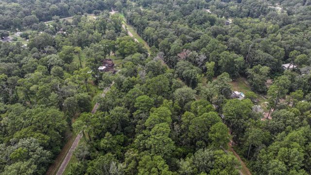 1 Cherry Laurel Ln, New Caney, TX 77357