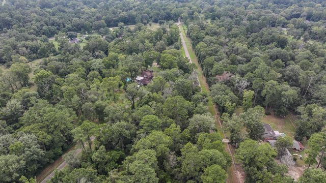 1 Cherry Laurel Ln, New Caney, TX 77357