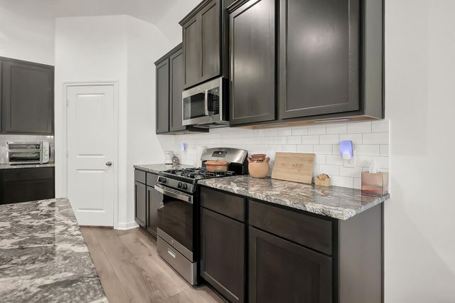 11696 Whirlaway Drive, Willis, TX 77318