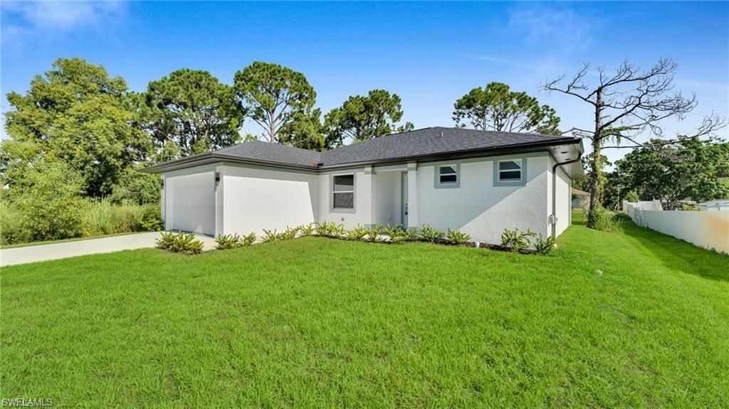 3210 30th ST SW, Lehigh Acres, FL 33976