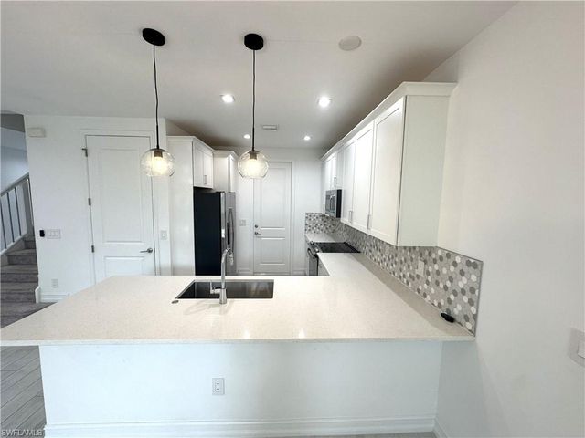 7509 Carnegie WAY, Naples, FL 34119