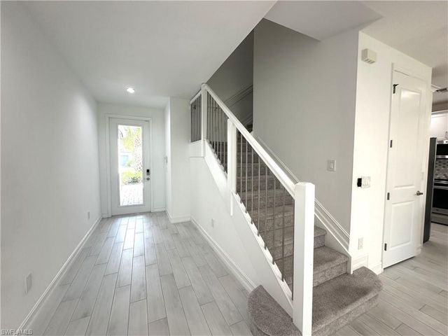 7509 Carnegie WAY, Naples, FL 34119
