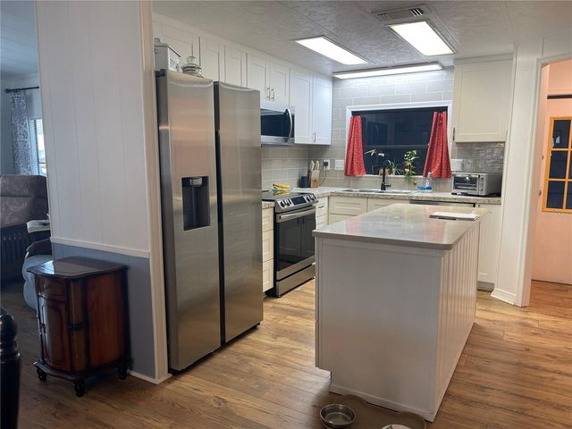 116 WINTERBERRY AVE., Wildwood, FL 34785