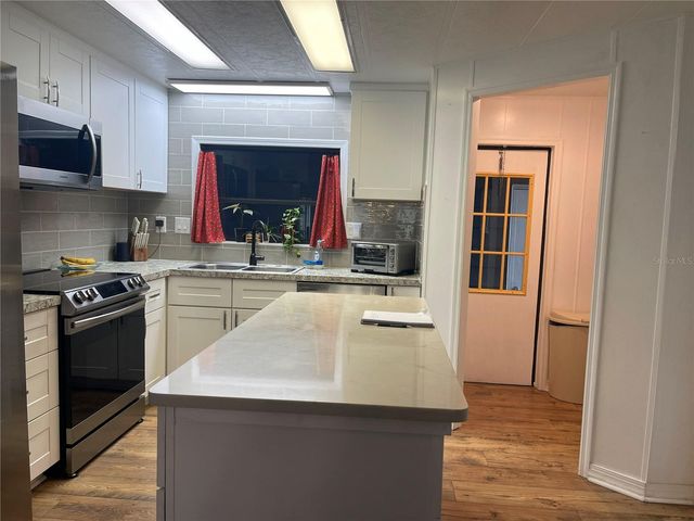 116 WINTERBERRY AVE., Wildwood, FL 34785