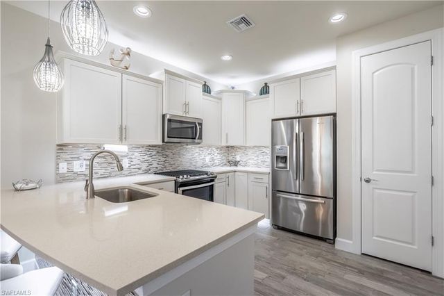 7717 Jacaranda LN, Naples, FL 34114