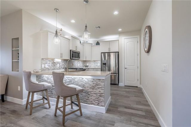 7717 Jacaranda LN, Naples, FL 34114