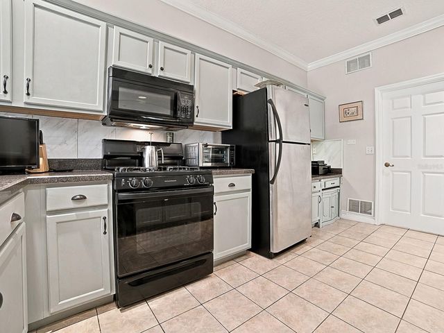 830 OLD OAKS LANE, Leesburg, FL 34748
