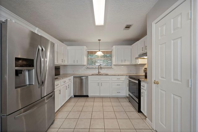7014 Charred Pine Drive, Magnolia, TX 77354