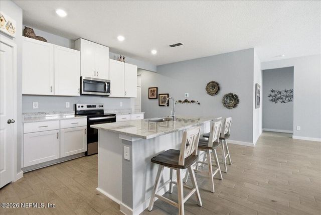 15 WANDERING CREEK Way, Palm Coast, FL 32164