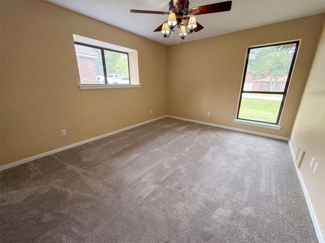 63 April Wind Drive S, Conroe, TX 77356
