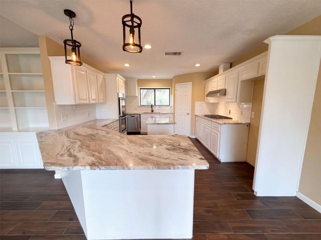 63 April Wind Drive S, Conroe, TX 77356