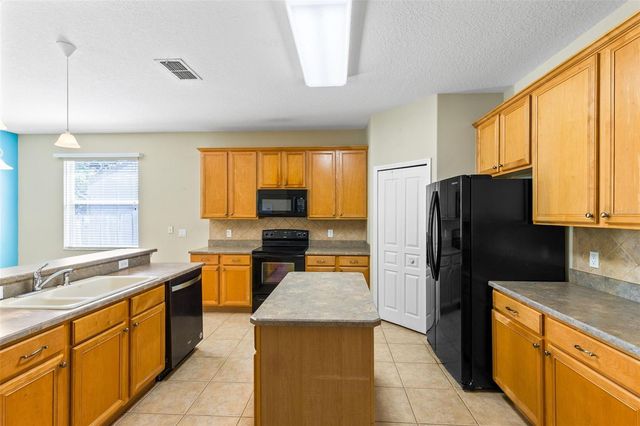 6658 LAKE PEMBROKE PLACE, Orlando, FL 32829