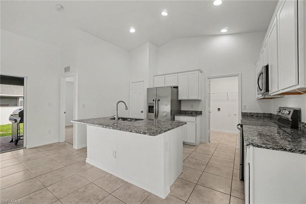Image 8 of property listing at 934 NW 7th AVE, Cape Coral, FL 33993