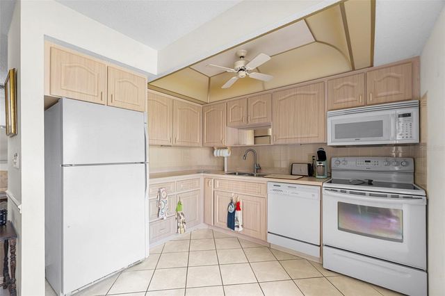 9 QUAILS RUN BOULEVARD 12, Englewood, FL 34223
