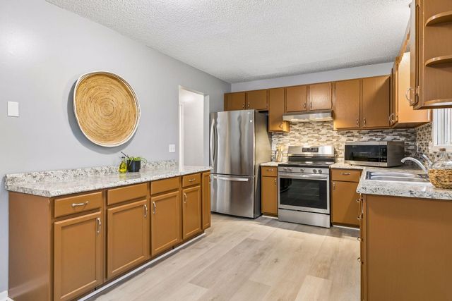 7852 Rimbley Road, Woodbury, MN 55125