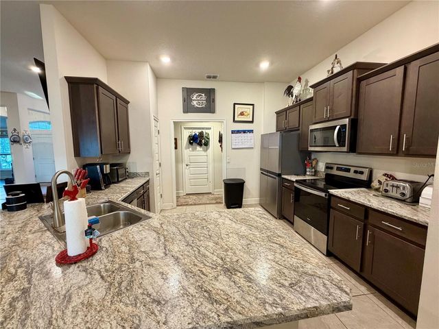 2225 ANGEL FISH LOOP, Leesburg, FL 34748