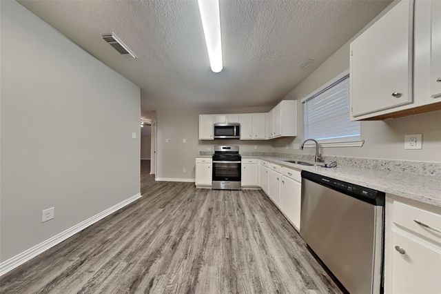 18623 Singing Woods Drive, Humble, TX 77346