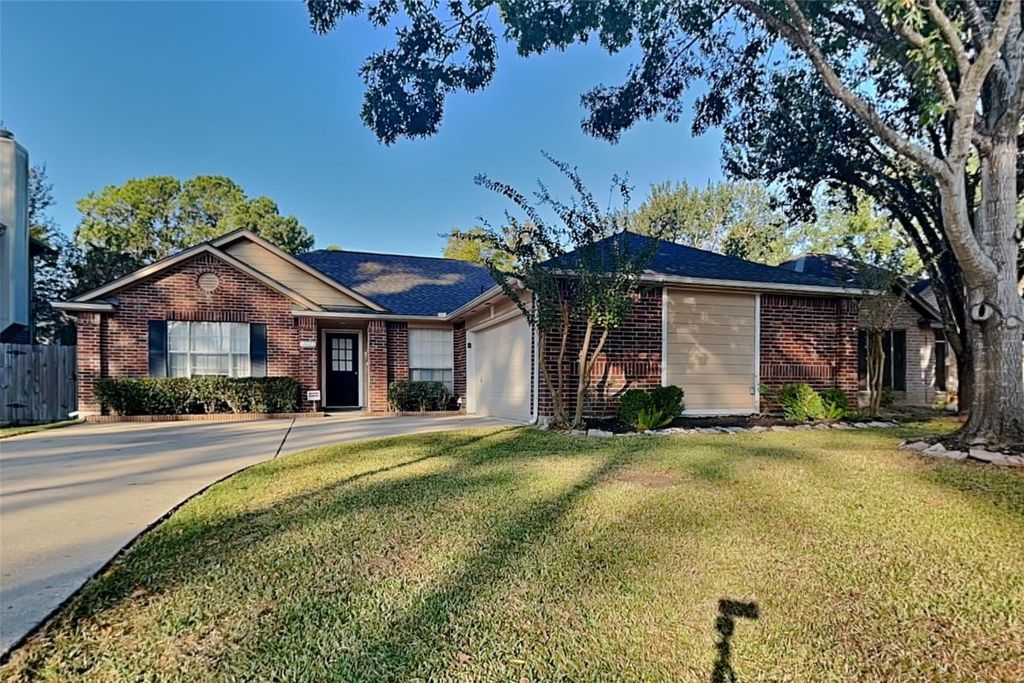 18623 Singing Woods Drive, Humble, TX 77346
