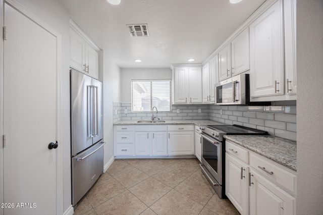 1676 N LA MORA Drive, Goodyear, AZ 85338