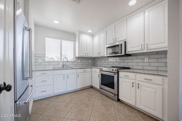 1676 N LA MORA Drive, Goodyear, AZ 85338