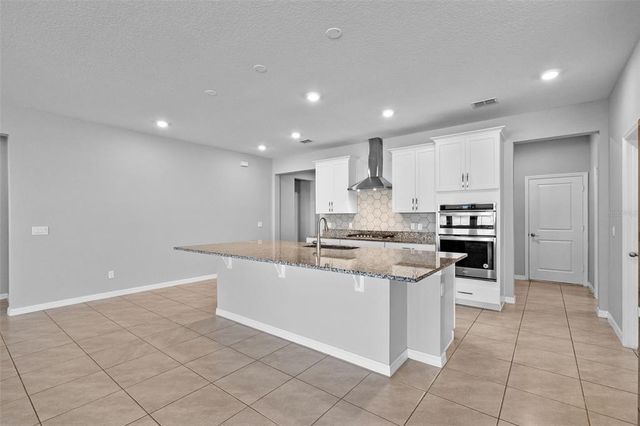 690 BLUE CITRUS LANE, Minneola, FL 34715