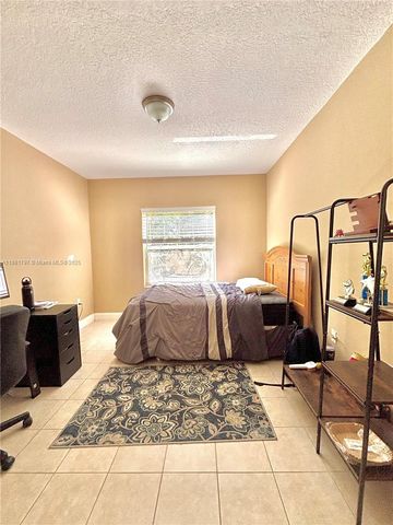 306 NW 115th way, Coral Springs, FL 33071