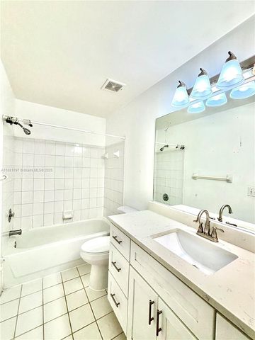 306 NW 115th way, Coral Springs, FL 33071