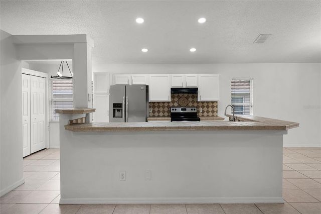 142 STONEGATE PASS, Davenport, FL 33897