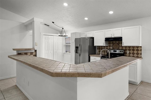 142 STONEGATE PASS, Davenport, FL 33897