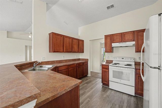 1714 PILCHARD DRIVE, Poinciana, FL 34759