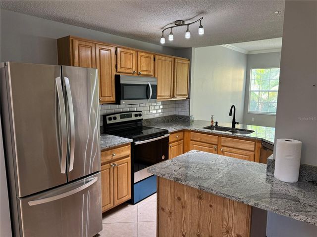 5600 BENTGRASS DRIVE 8-103, Sarasota, FL 34235