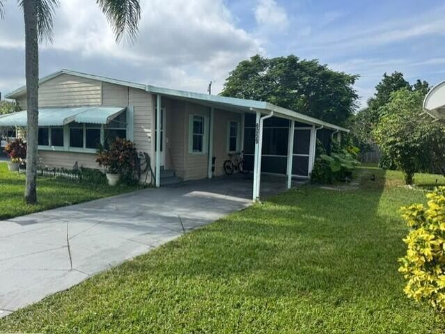 6059 Palm Harbour Drive, Atlantis, FL 33462