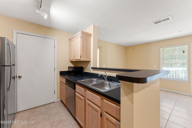 7701 TIMBERLIN PARK Boulevard, 826, Jacksonville, FL 32256